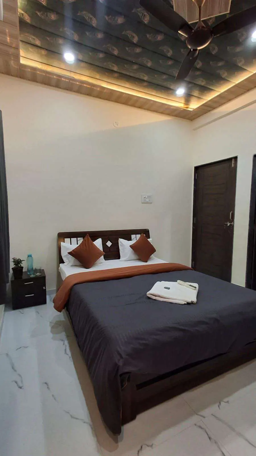 Air-conditioned bedroom in Shuubh Aavishkar 2BHK Villa, a 2 BHK villa in Lonavala on rent