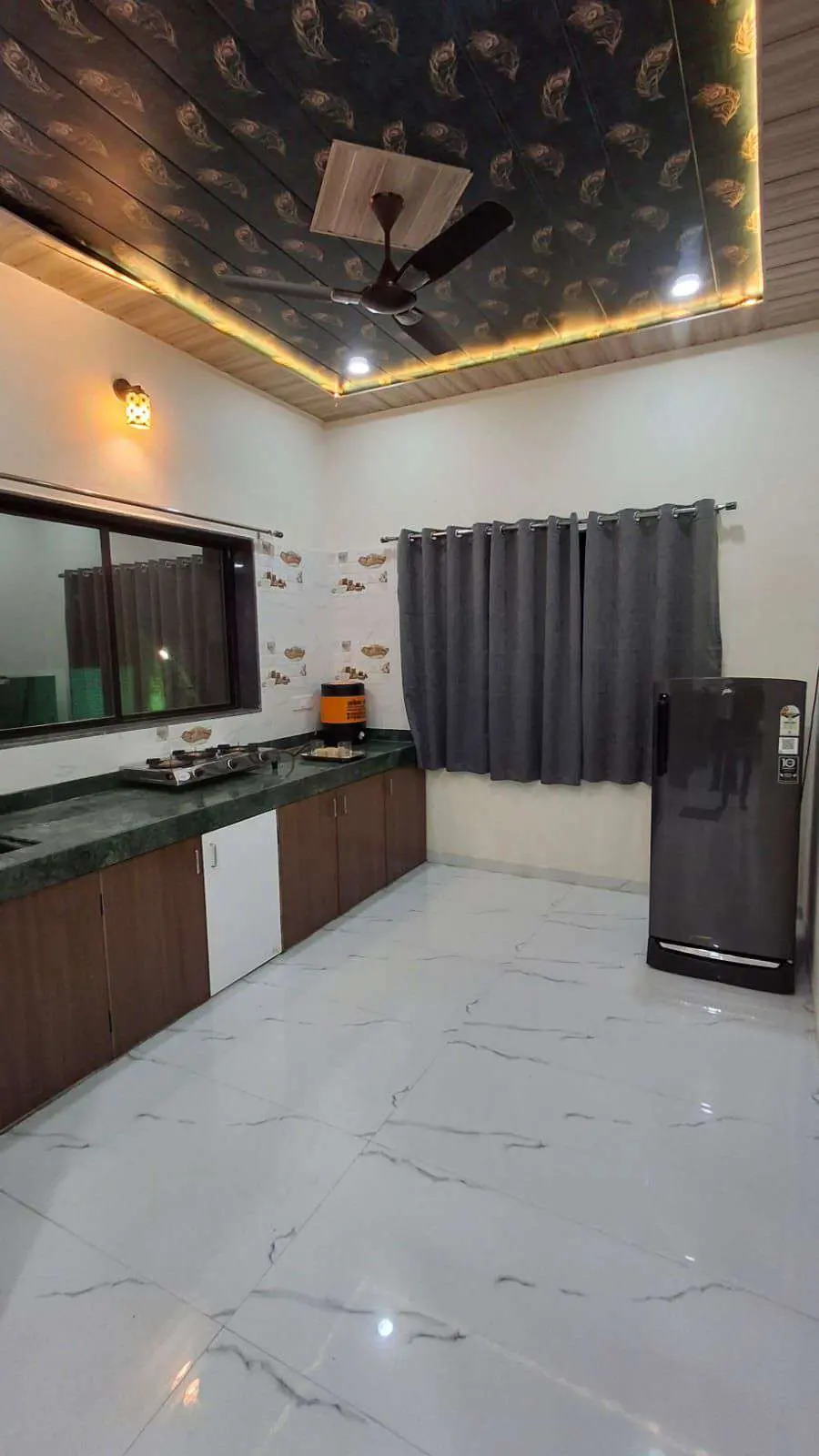 Fully equipped kitchen in Shuubh Aavishkar 2BHK Villa, a 2 BHK villa in Lonavala on rent