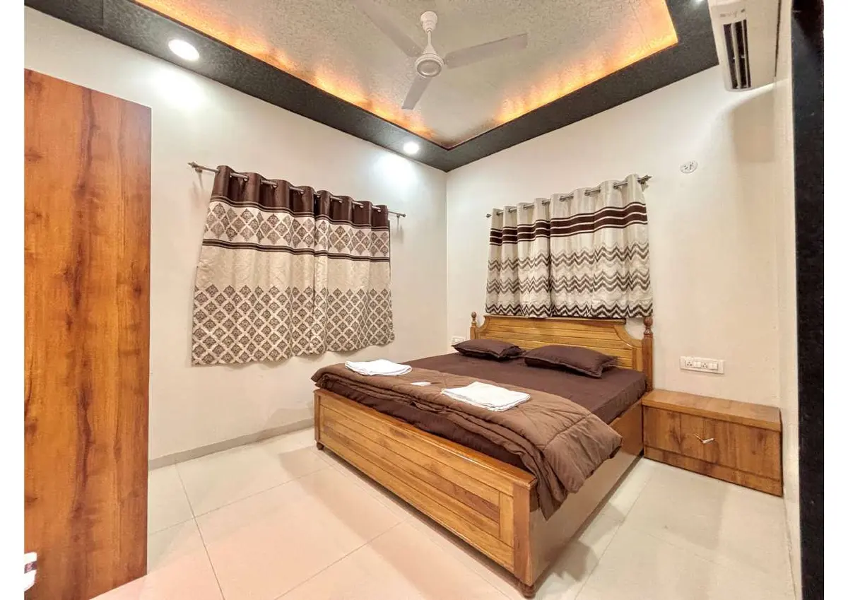 Air-conditioned bedroom in Duke's Nose Villa, a 4 BHK villa in Lonavala on rent