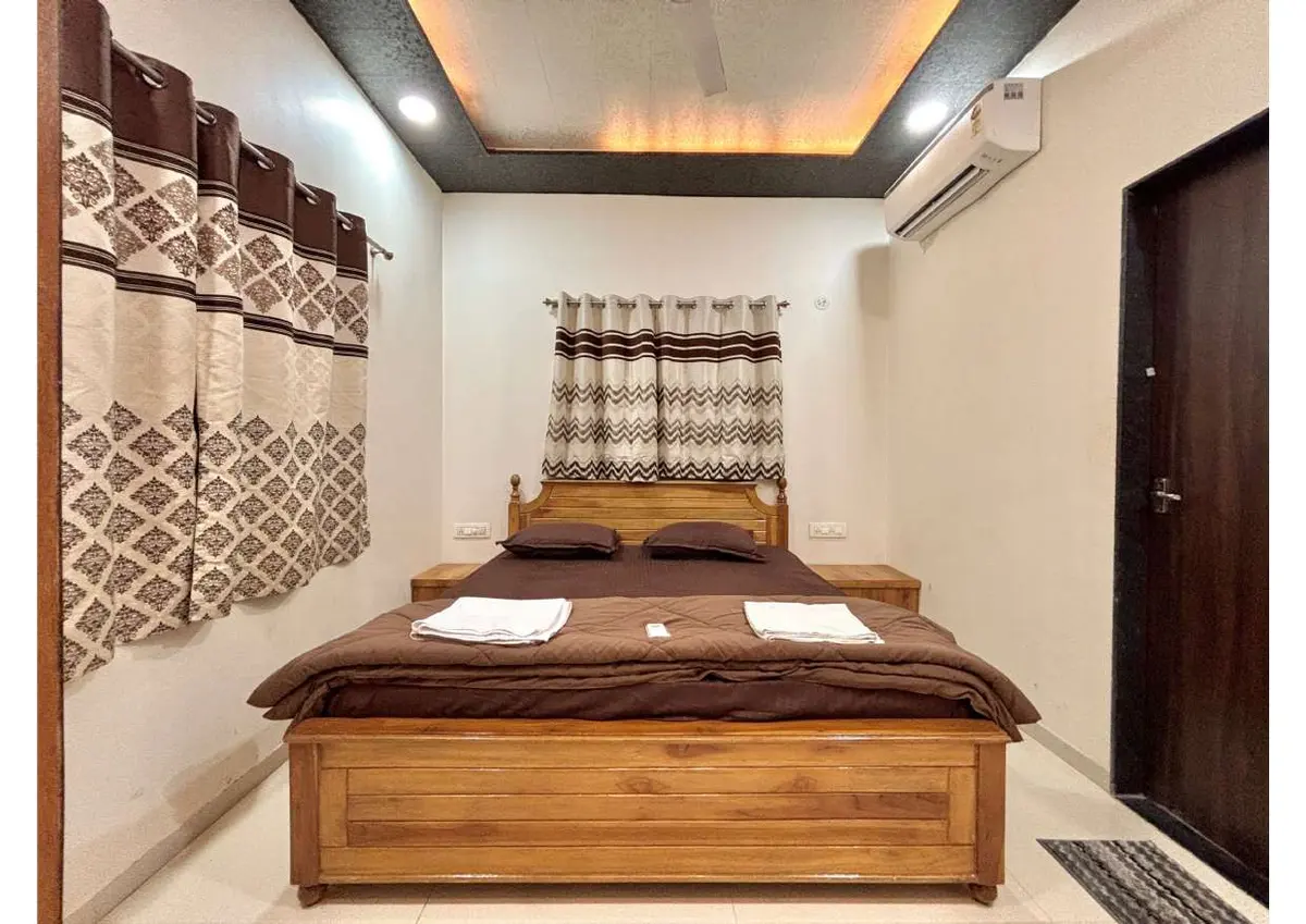 Air-conditioned bedroom in Duke's Nose Villa, a 4 BHK villa in Lonavala on rent