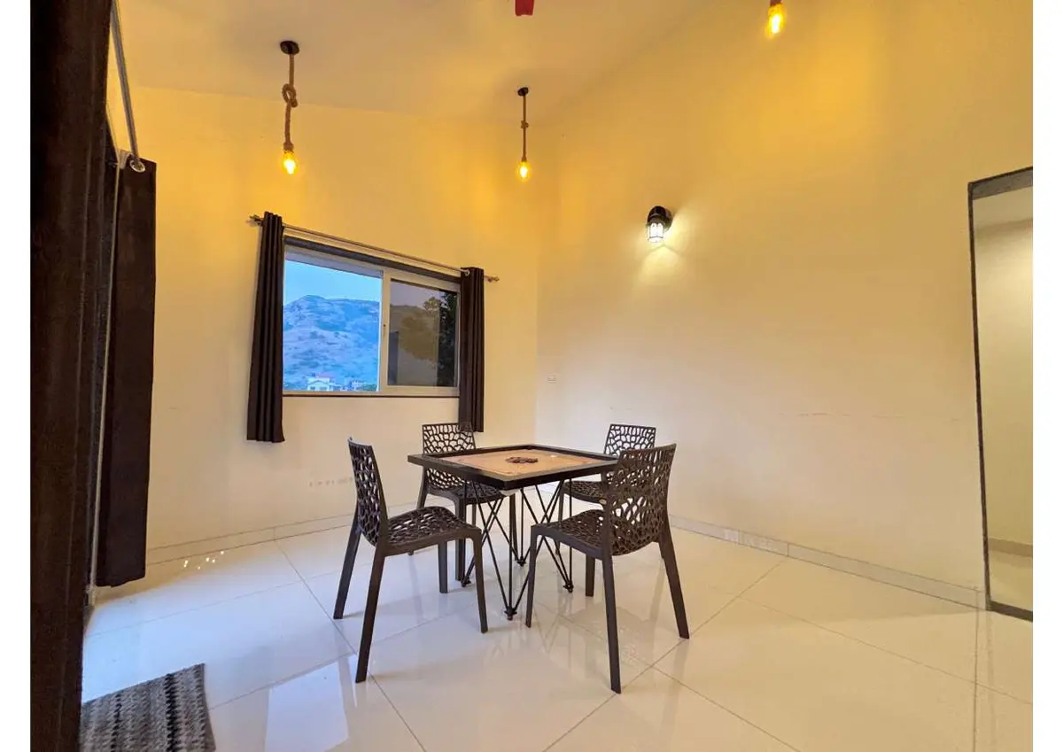 Living and lounge area in Duke's Nose Villa, a 4 BHK villa in Lonavala on rent