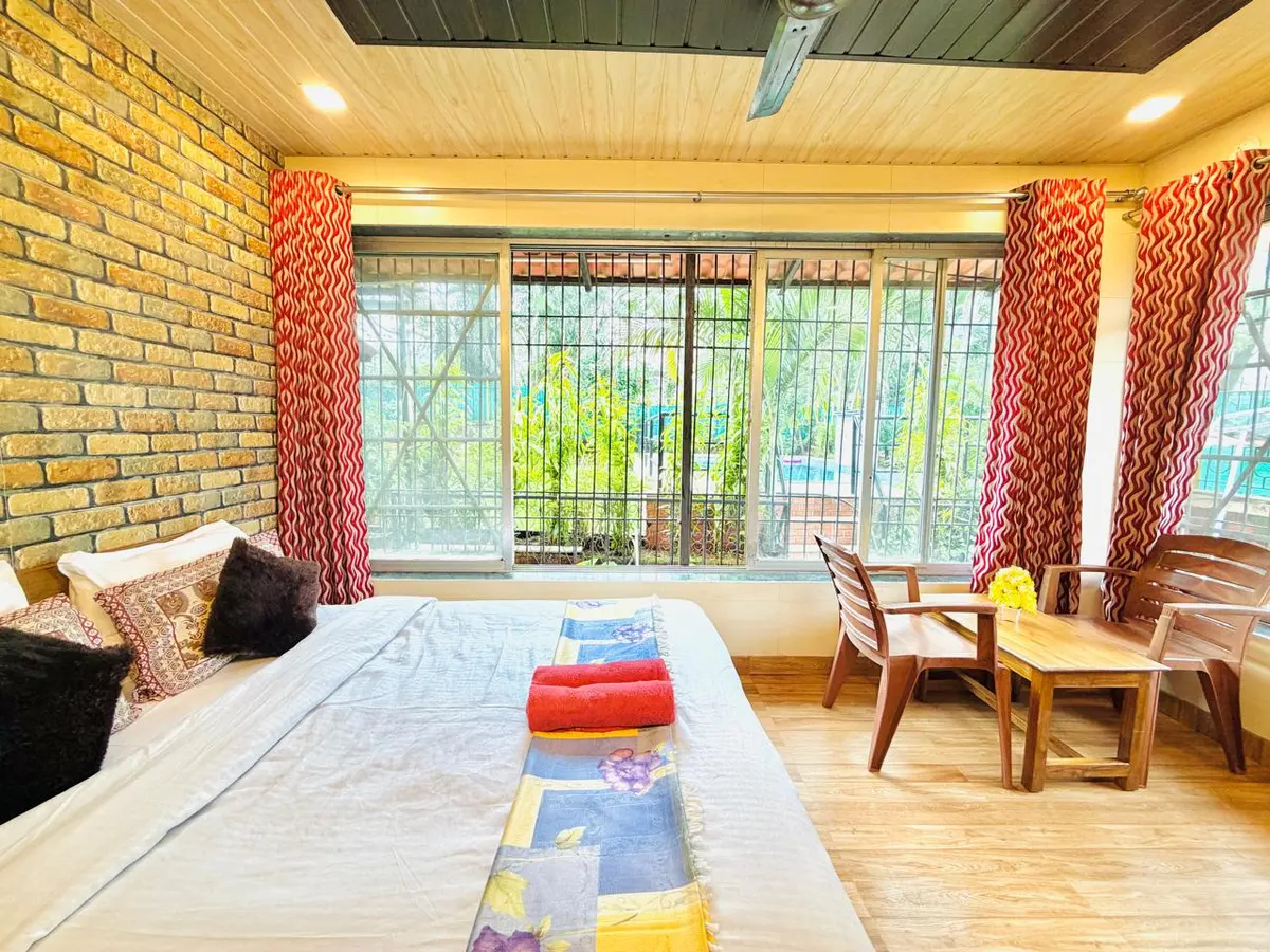 Air-conditioned bedroom in Elite Villa, a 4 BHK villa in Lonavala on rent