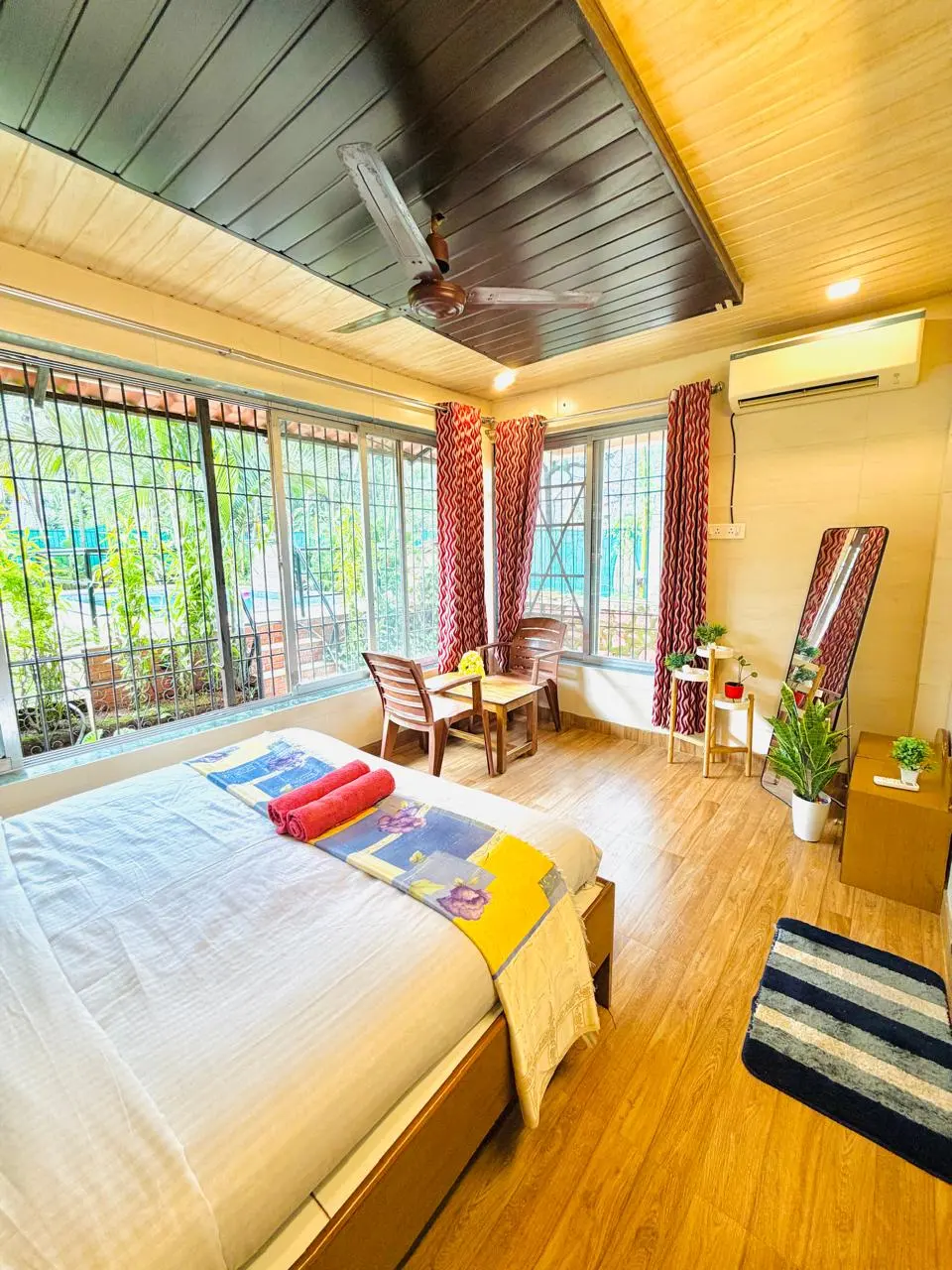 Air-conditioned bedroom in Elite Villa, a 4 BHK villa in Lonavala on rent