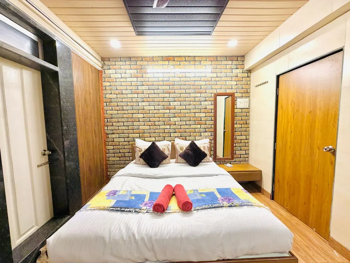 Air-conditioned bedroom in Elite Villa, a 4 BHK villa in Lonavala on rent