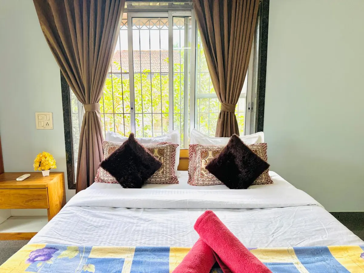 Air-conditioned bedroom in Elite Villa, a 4 BHK villa in Lonavala on rent