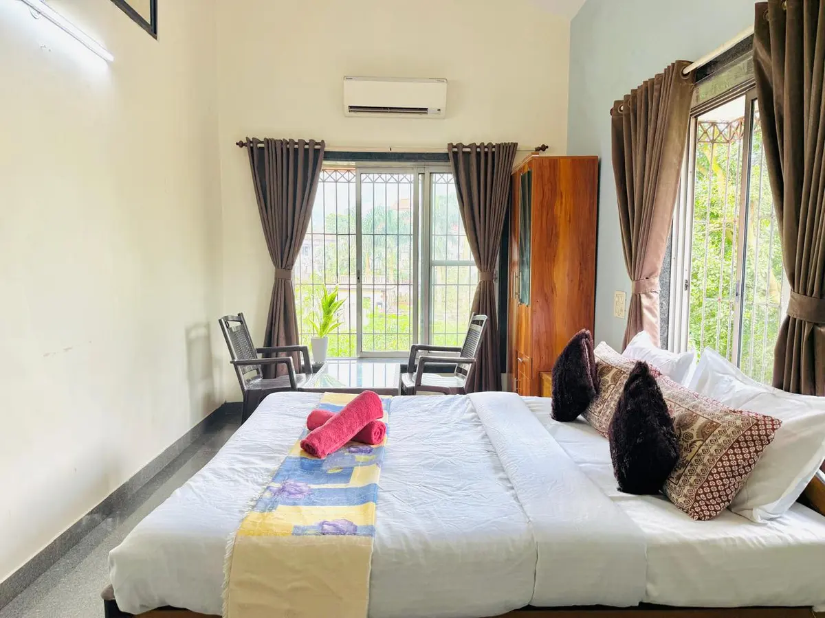 Air-conditioned bedroom in Elite Villa, a 4 BHK villa in Lonavala on rent