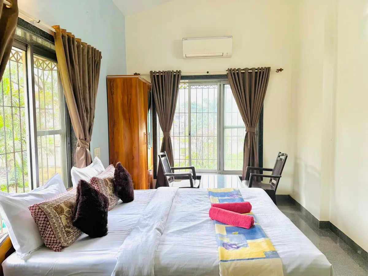 Air-conditioned bedroom in Elite Villa, a 4 BHK villa in Lonavala on rent
