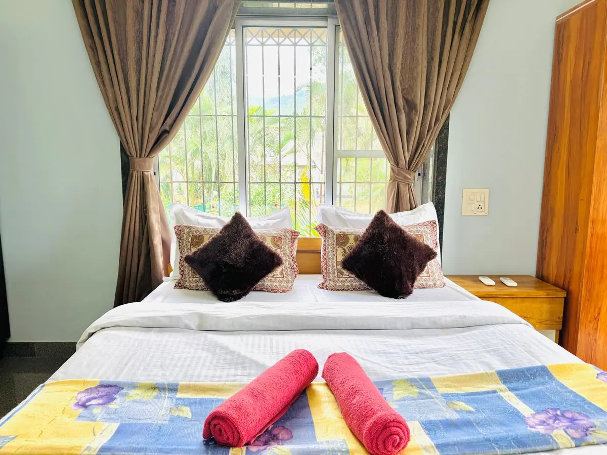 Air-conditioned bedroom in Elite Villa, a 4 BHK villa in Lonavala on rent