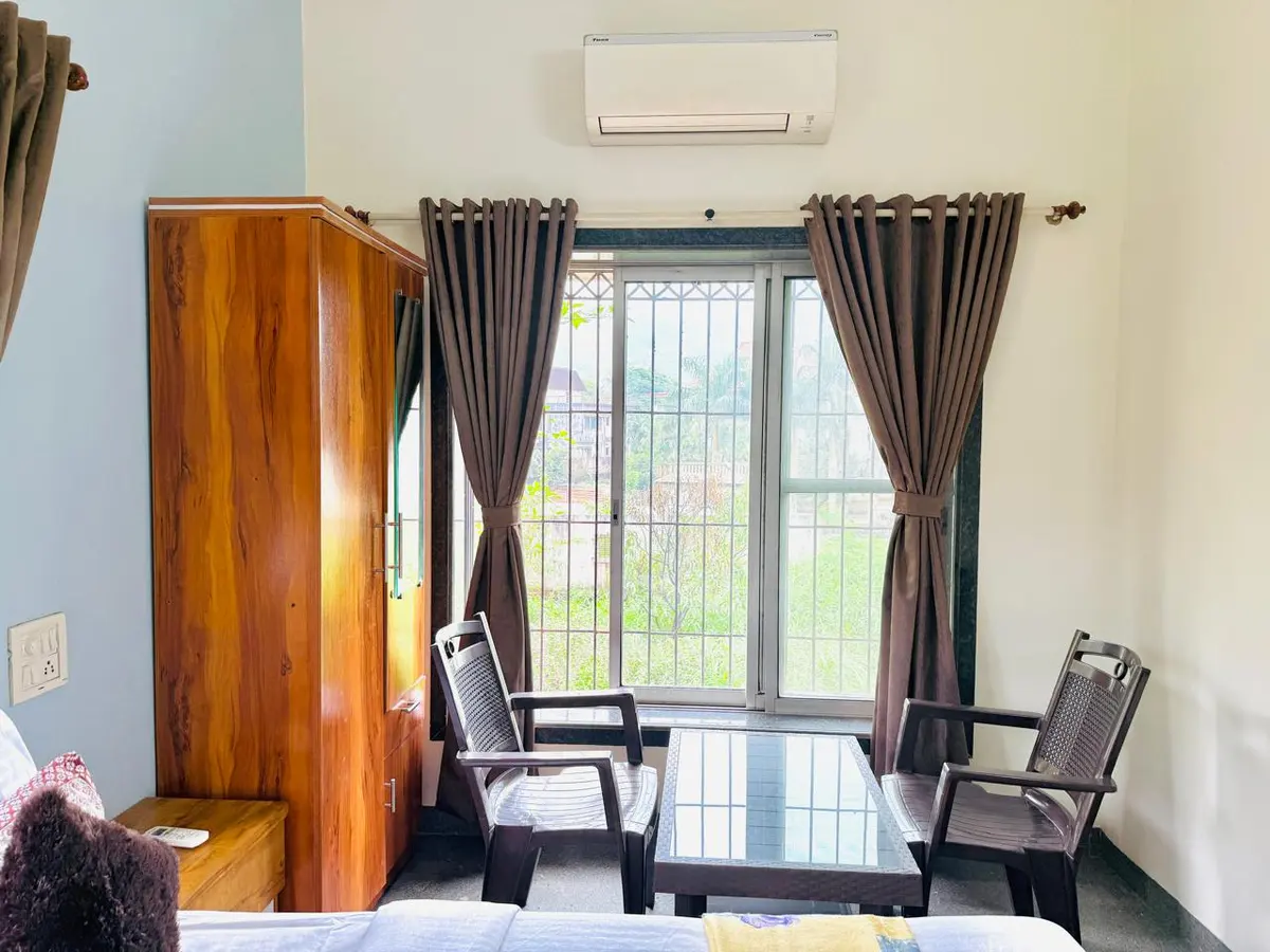 Air-conditioned bedroom in Elite Villa, a 4 BHK villa in Lonavala on rent