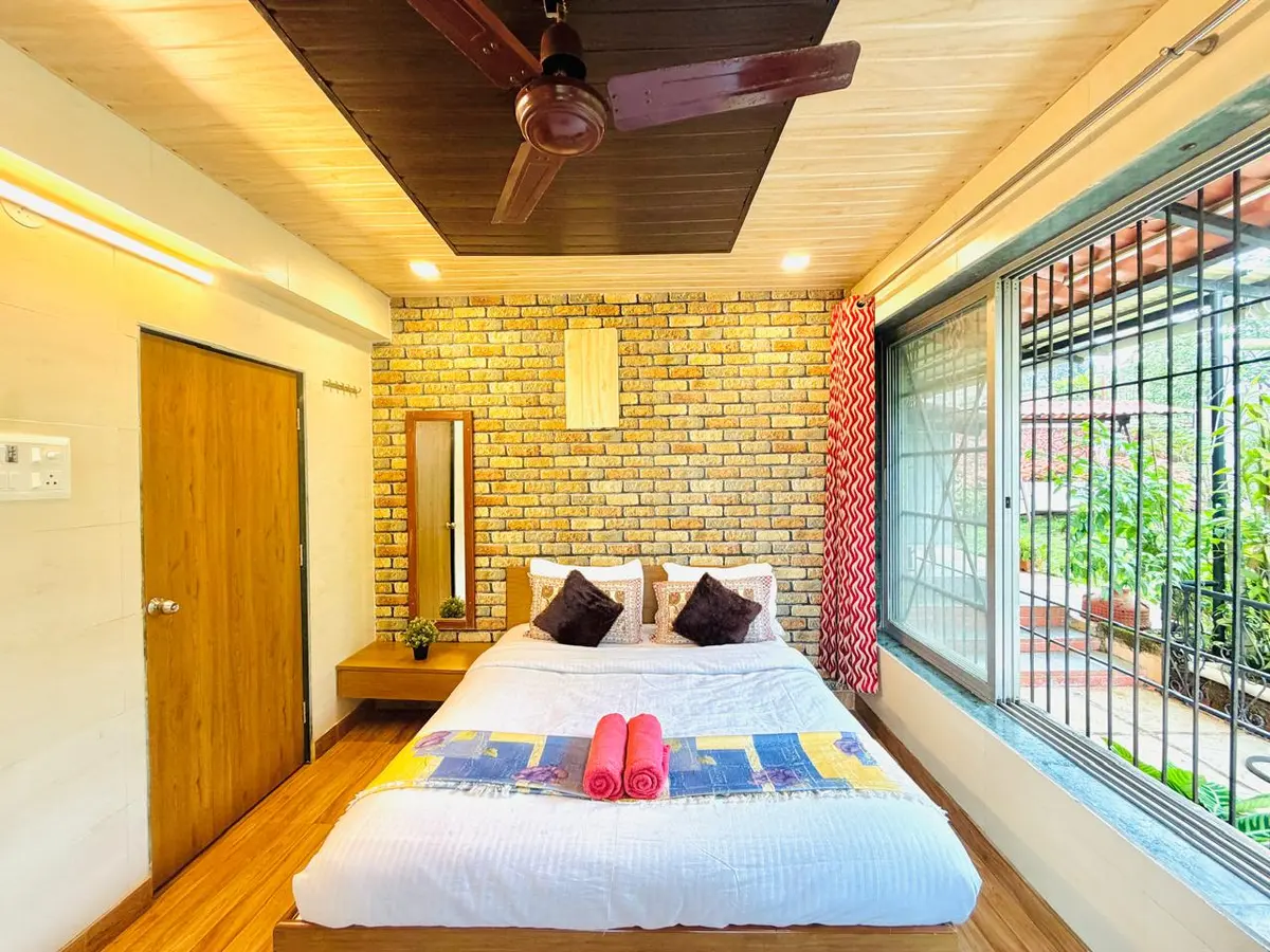Air-conditioned bedroom in Elite Villa, a 4 BHK villa in Lonavala on rent