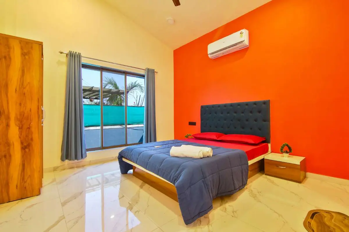 Air-conditioned bedroom in Shuubh Hillside 4BHK Villa, a 4 BHK villa in Lonavala on rent