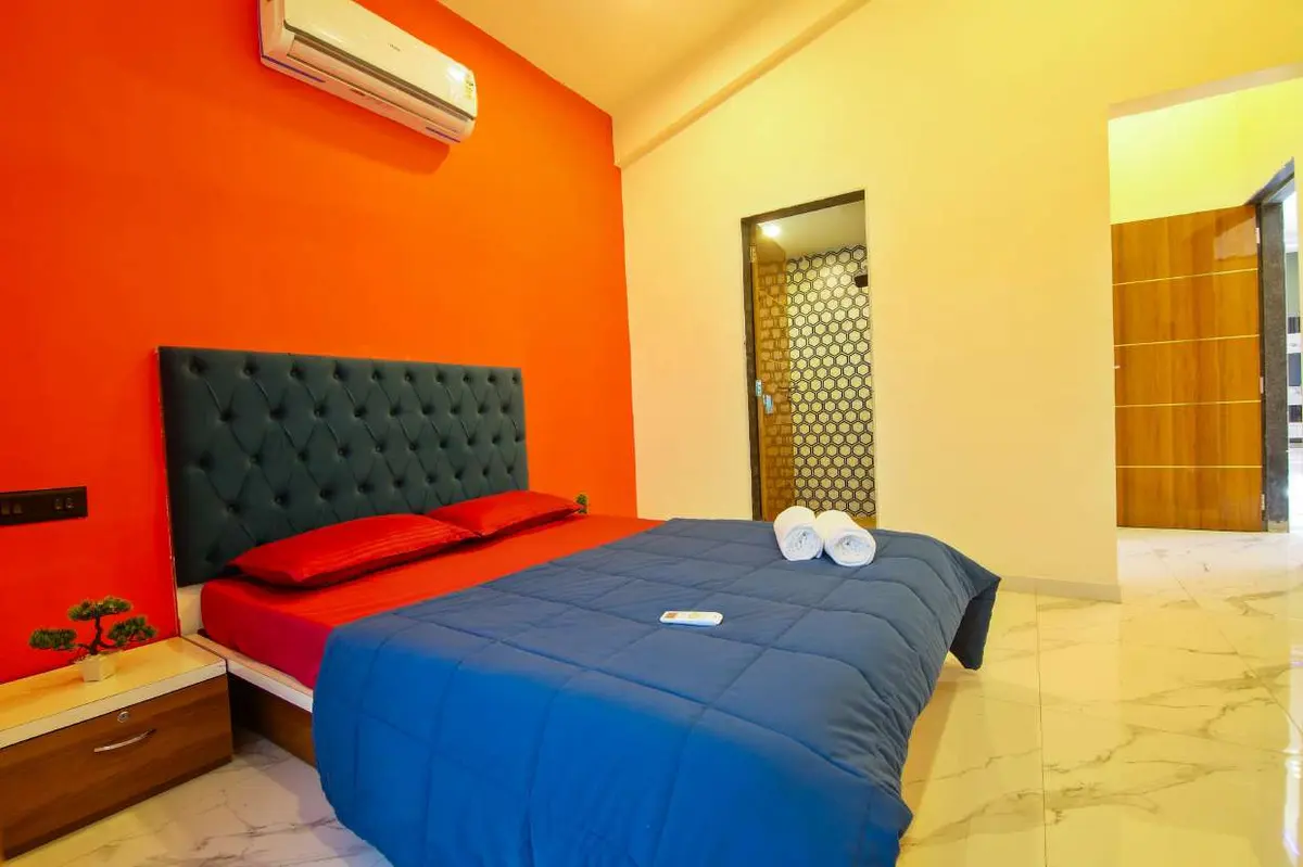 Air-conditioned bedroom in Shuubh Hillside 4BHK Villa, a 4 BHK villa in Lonavala on rent