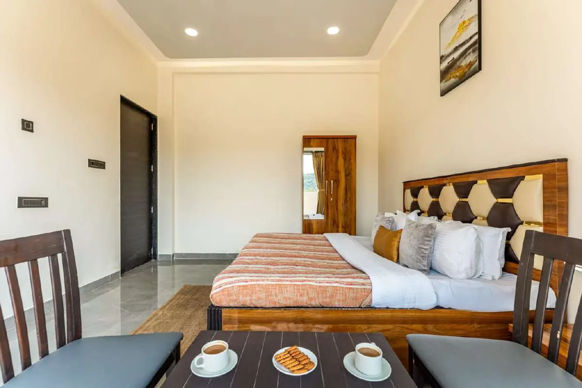 Air-conditioned bedroom in Shuubh Kaustubh 5BHK Villa, a 5 BHK villa in Lonavala on rent