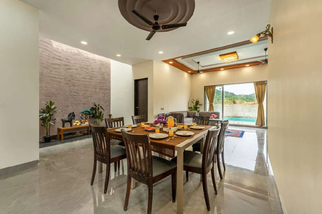 Dining table laid for the group at Shuubh Kaustubh 5BHK Villa, Lonavala