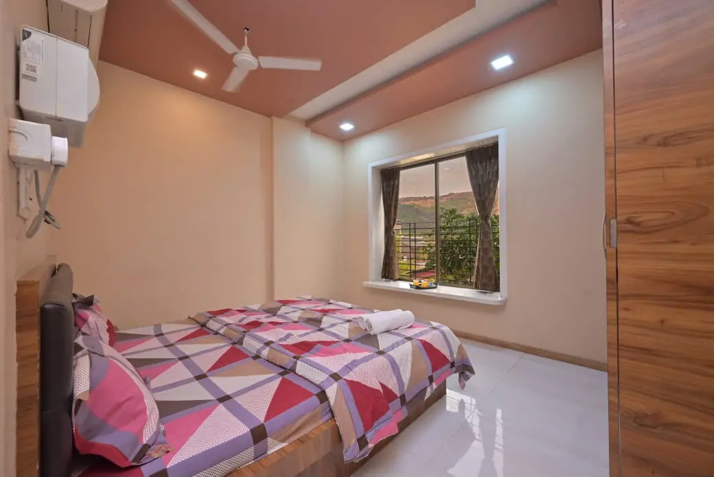 Air-conditioned bedroom in Shuubh Mountain Amber 5BHK Villa, a 5 BHK villa in Lonavala on rent