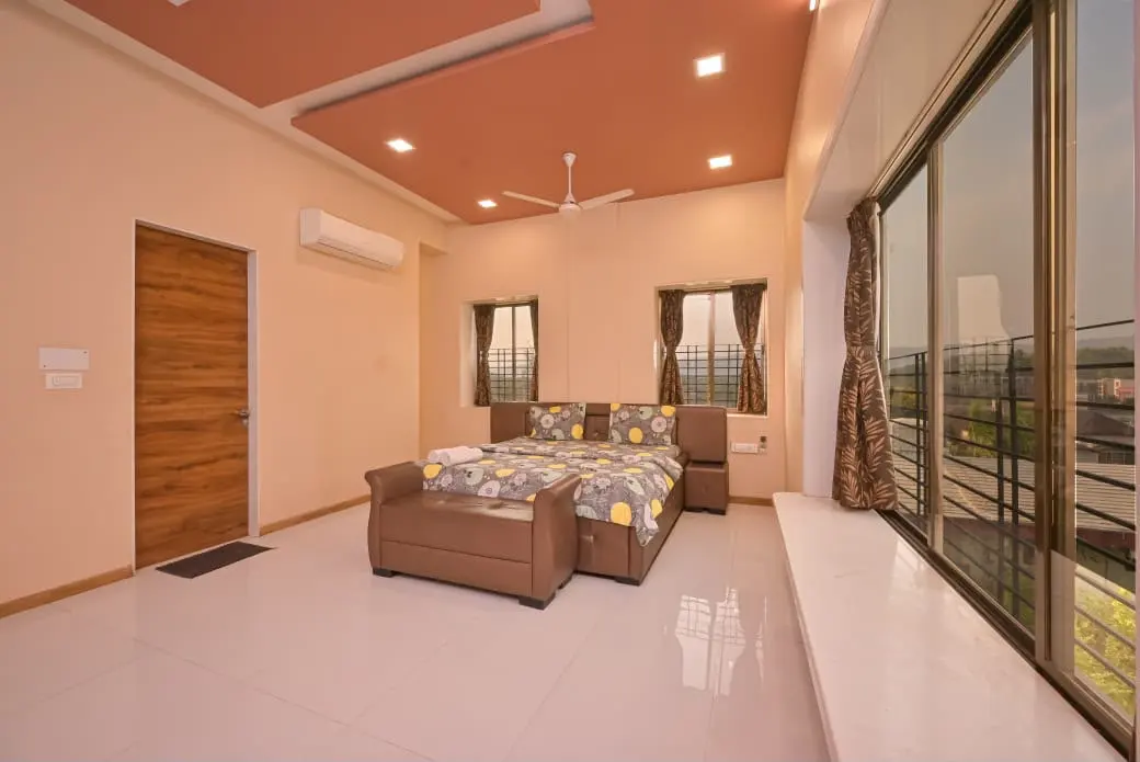 Air-conditioned bedroom in Shuubh Mountain Amber 5BHK Villa, a 5 BHK villa in Lonavala on rent