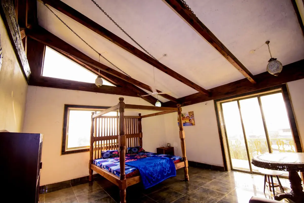Air-conditioned bedroom in Shuubh Mountain Nest 6BHK Villa, a 6 BHK villa in Lonavala on rent
