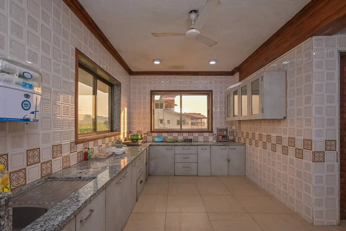 Fully equipped kitchen in Shuubh Mountain Nest 6BHK Villa, a 6 BHK villa in Lonavala on rent