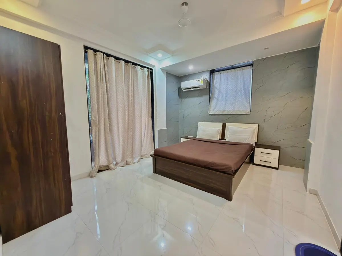 Air-conditioned bedroom in Shuubh Star 4BHK Villa, a 4 BHK villa in Lonavala on rent