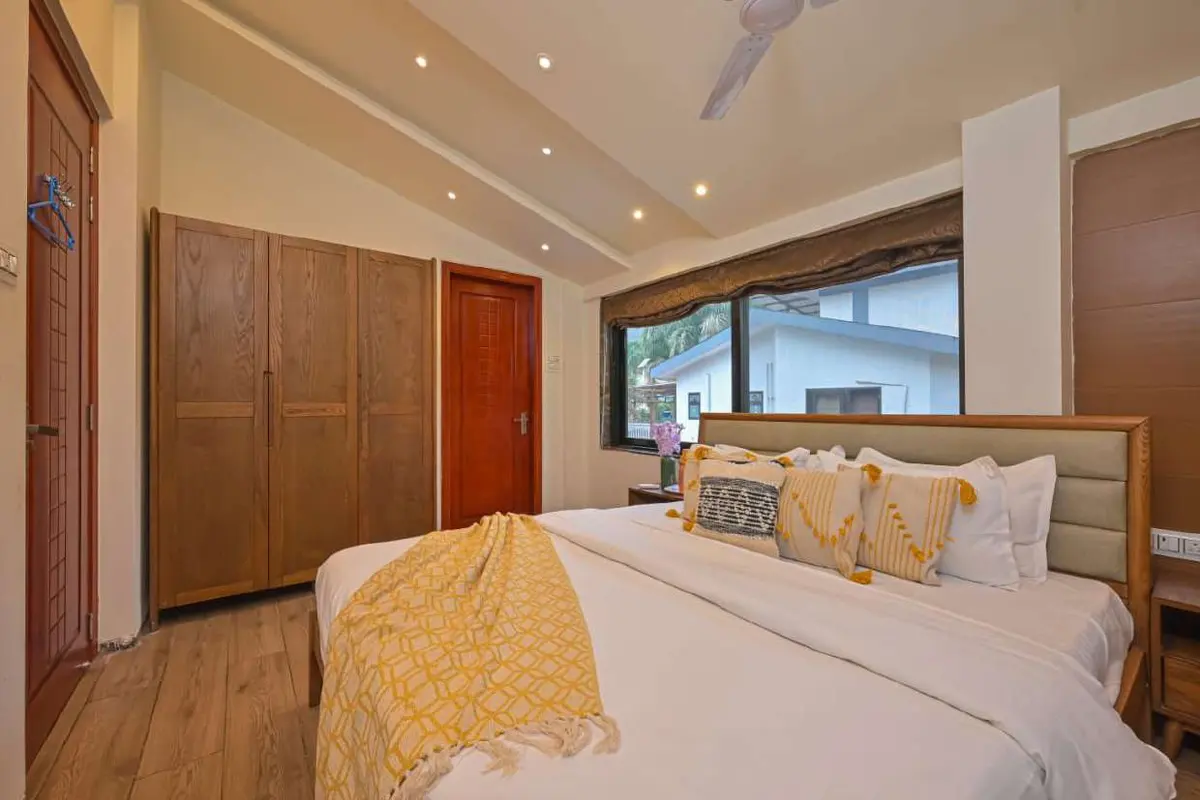Air-conditioned bedroom in Shuubh Staycation 3BHK Villa, a 3 BHK villa in Lonavala on rent