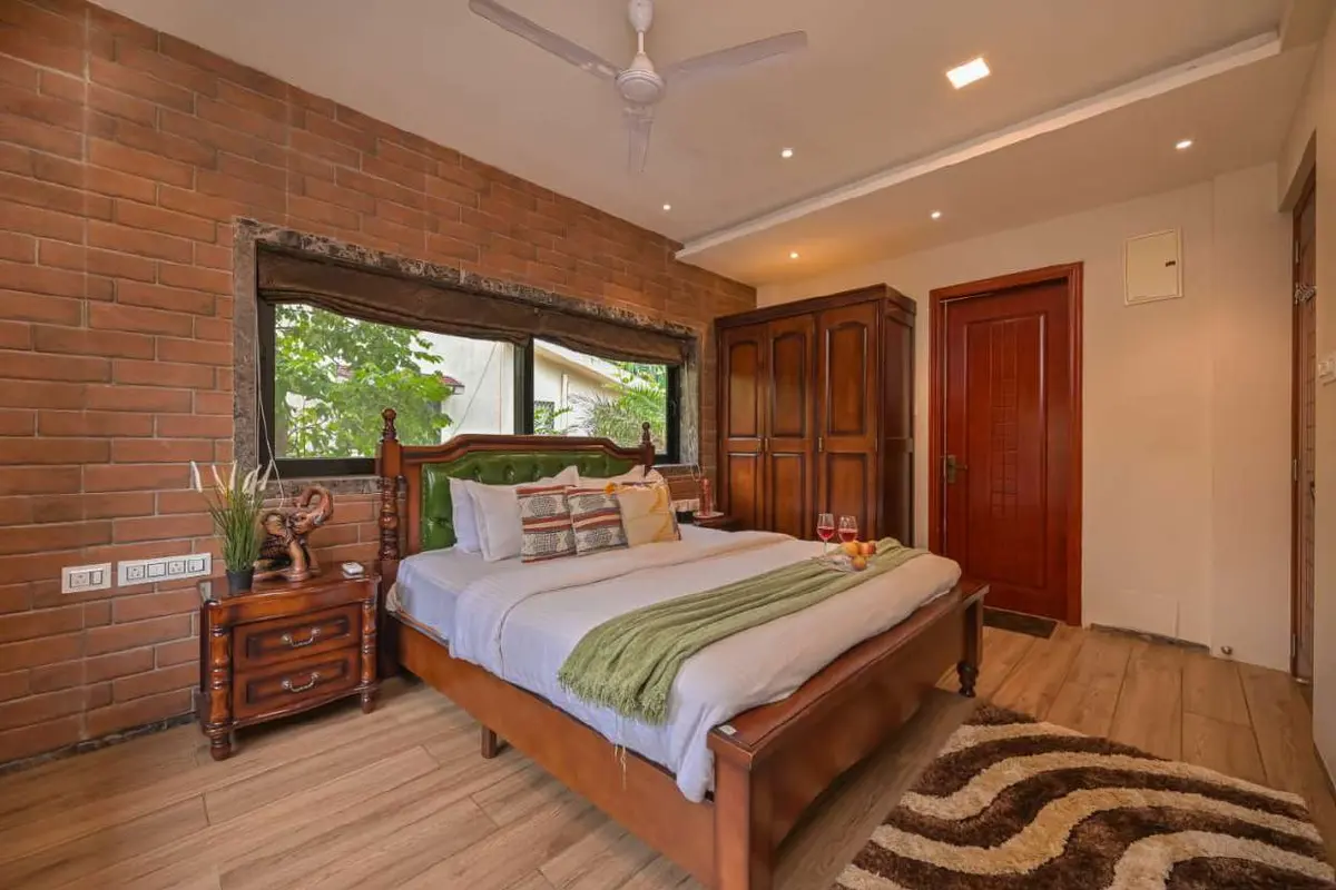 Air-conditioned bedroom in Shuubh Staycation 3BHK Villa, a 3 BHK villa in Lonavala on rent
